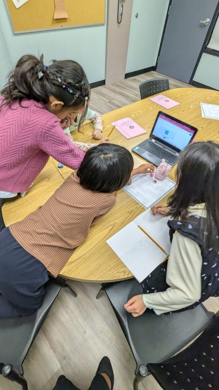Students working together in a small group.